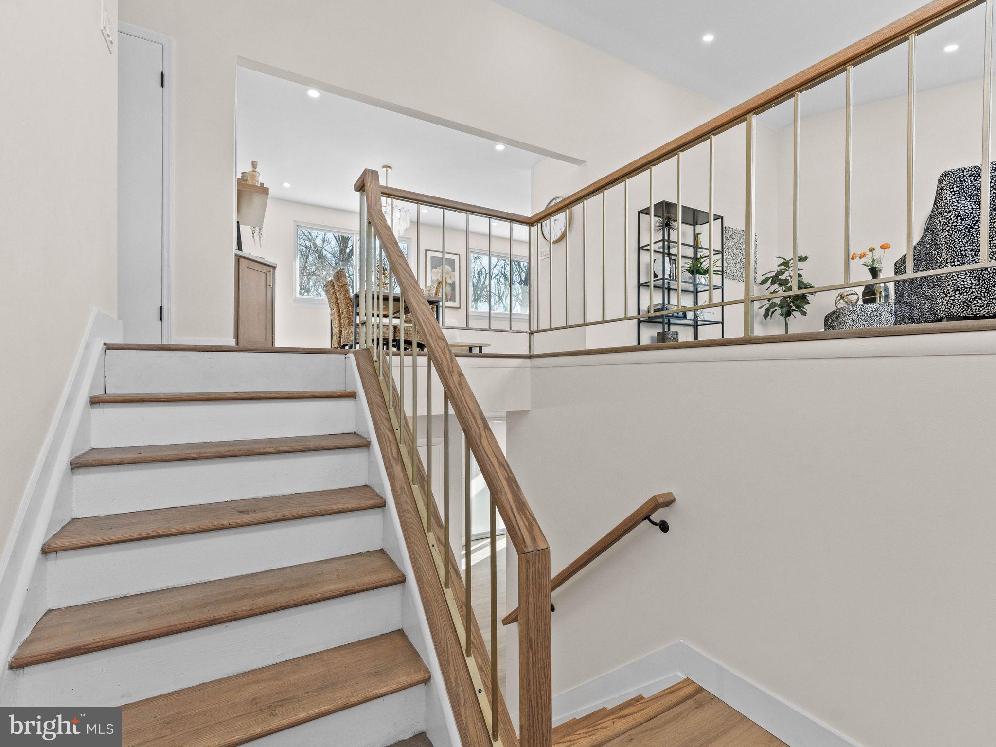 366 Independence Boulevard Lawnside, NJ 08045 - Photo 11 of 41 a view of entryway with wooden floor and stairs