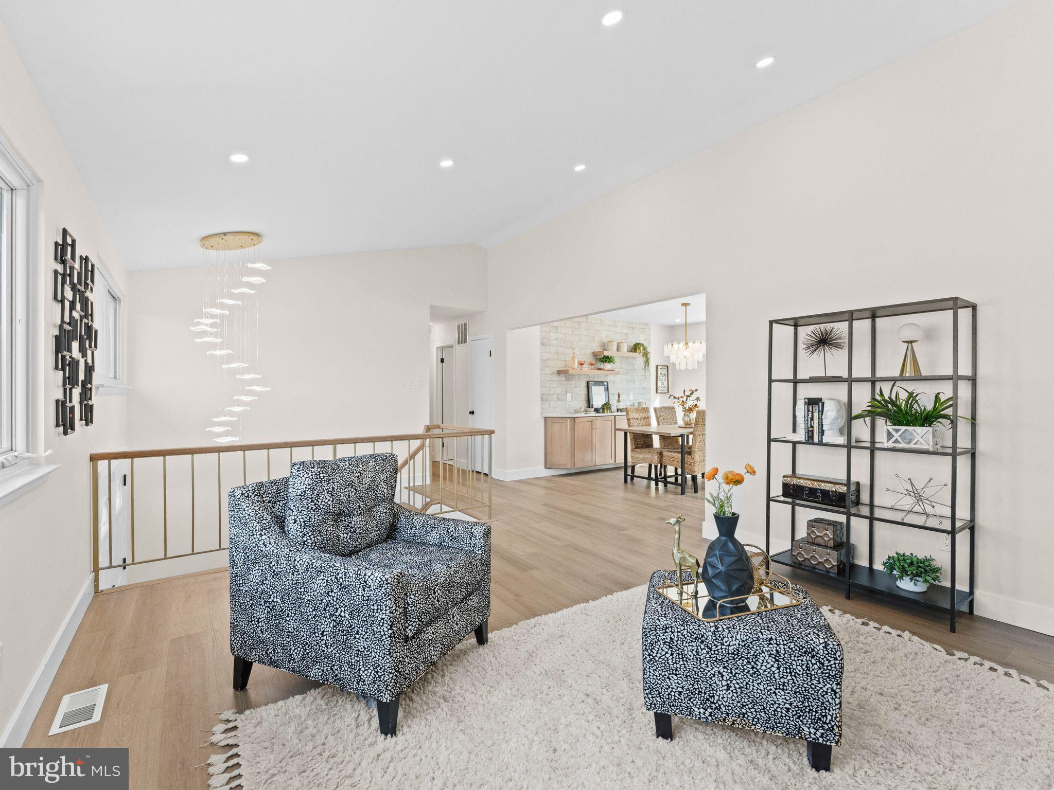 366 Independence Boulevard Lawnside, NJ 08045 - Photo 14 of 41 a living room with furniture and a floor to ceiling window