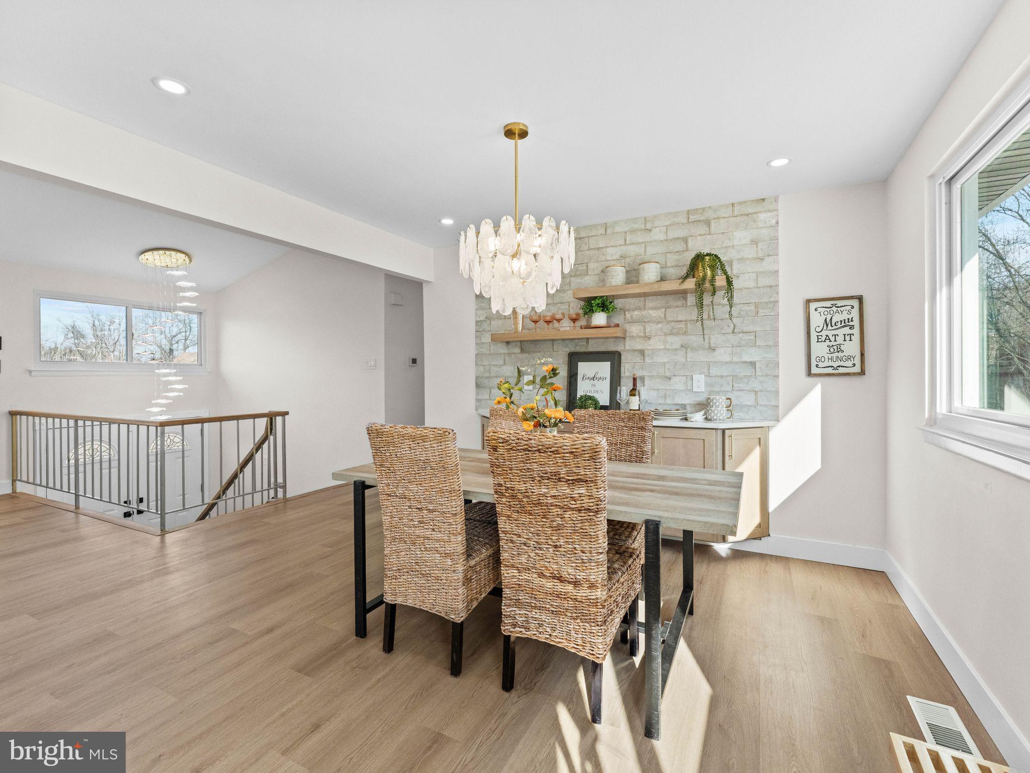 366 Independence Boulevard Lawnside, NJ 08045 - Photo 15 of 41 a view of a dining room with furniture window and wooden floor