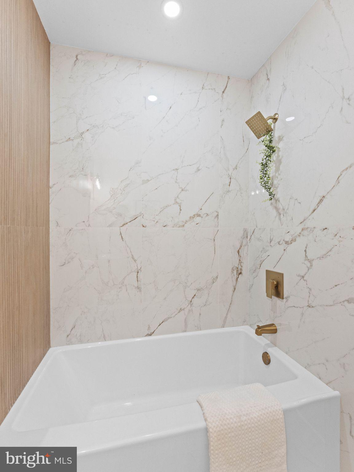 366 Independence Boulevard Lawnside, NJ 08045 - Photo 28 of 41 a bathroom with a bathtub