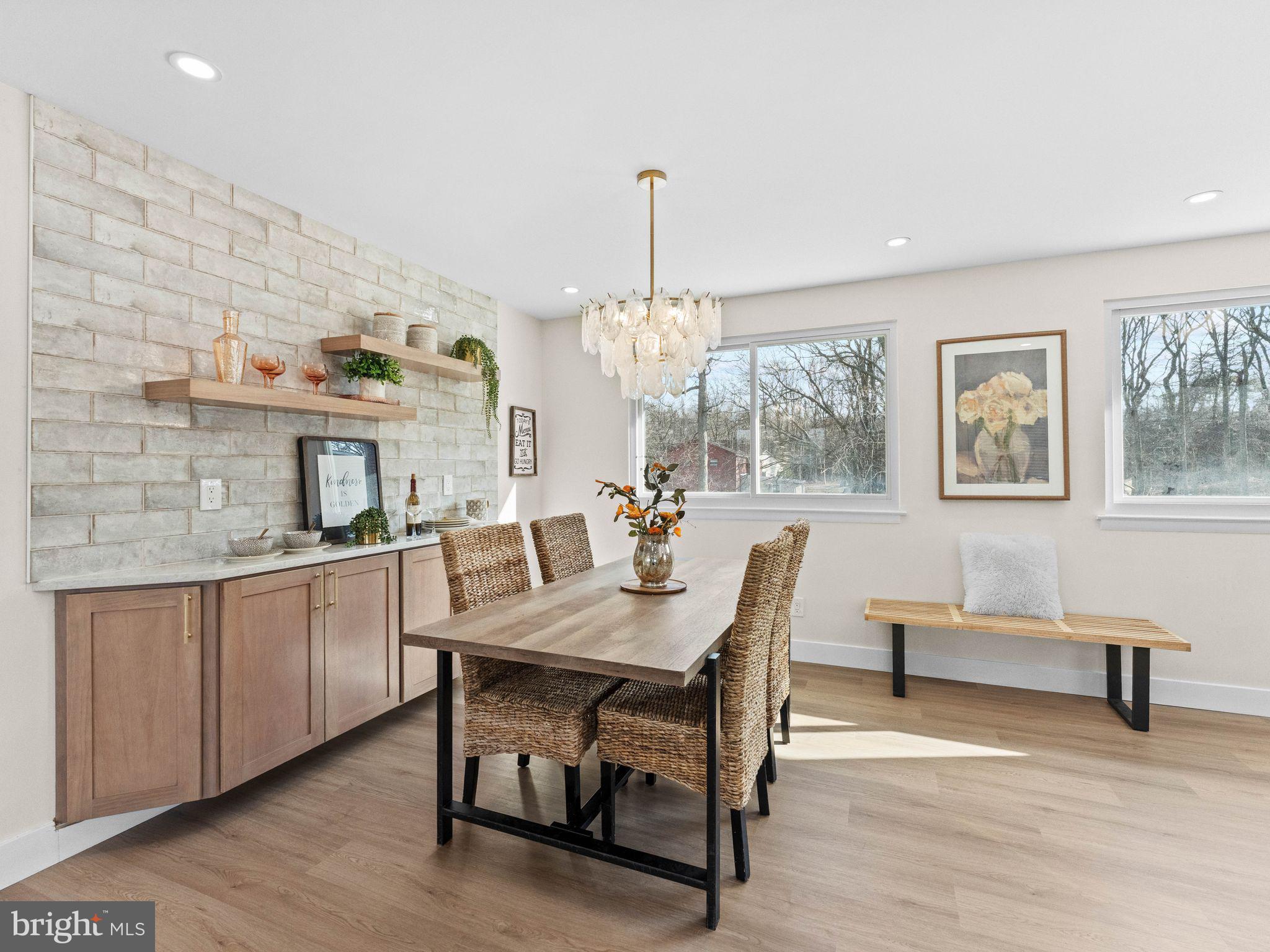 366 Independence Boulevard Lawnside, NJ 08045 - Photo 3 of 41 a view of a dining room with furniture window and wooden floor