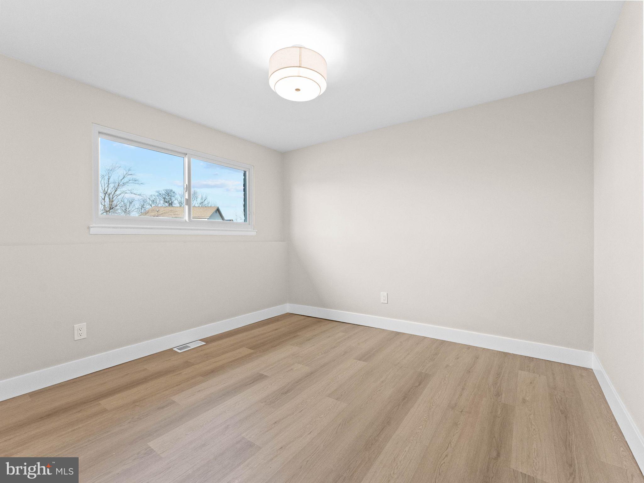 366 Independence Boulevard Lawnside, NJ 08045 - Photo 31 of 41 wooden floor in an empty room