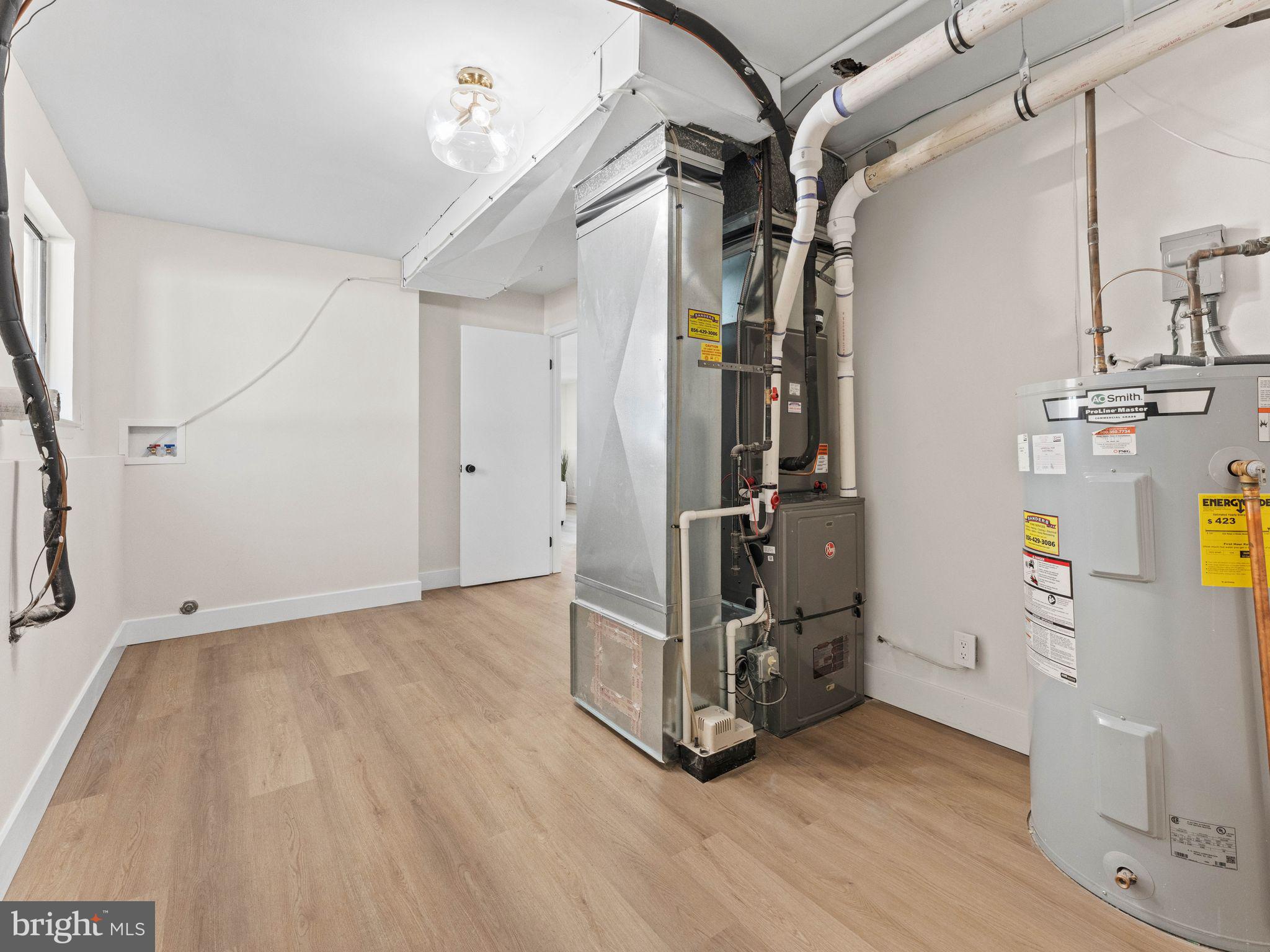 366 Independence Boulevard Lawnside, NJ 08045 - Photo 38 of 41 a view of hallway with wooden floor