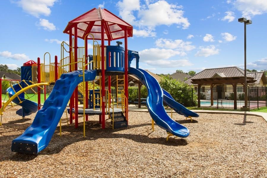 407 Summerset Landing Court Conroe, TX 77304 - Photo 13 of 15 a view of a slide with a slide