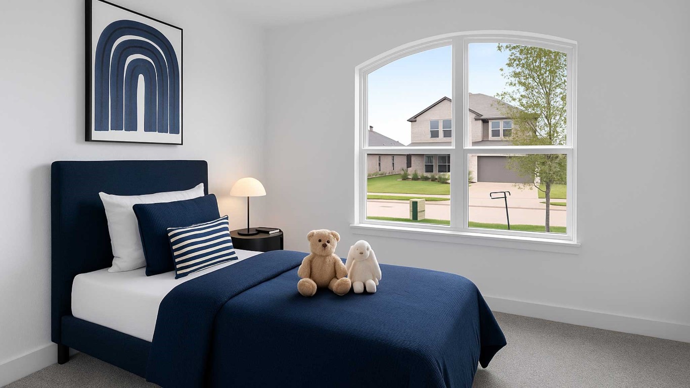 407 Summerset Landing Court Conroe, TX 77304 - Photo 6 of 15 a bedroom with a bed and a window