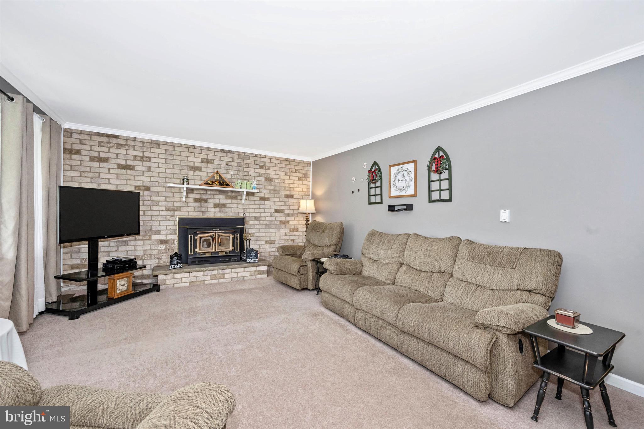 1023 St Michaels Road Mount Airy, MD 21771 - Photo 4 of 76 Brick wall/hearth wood burning stove