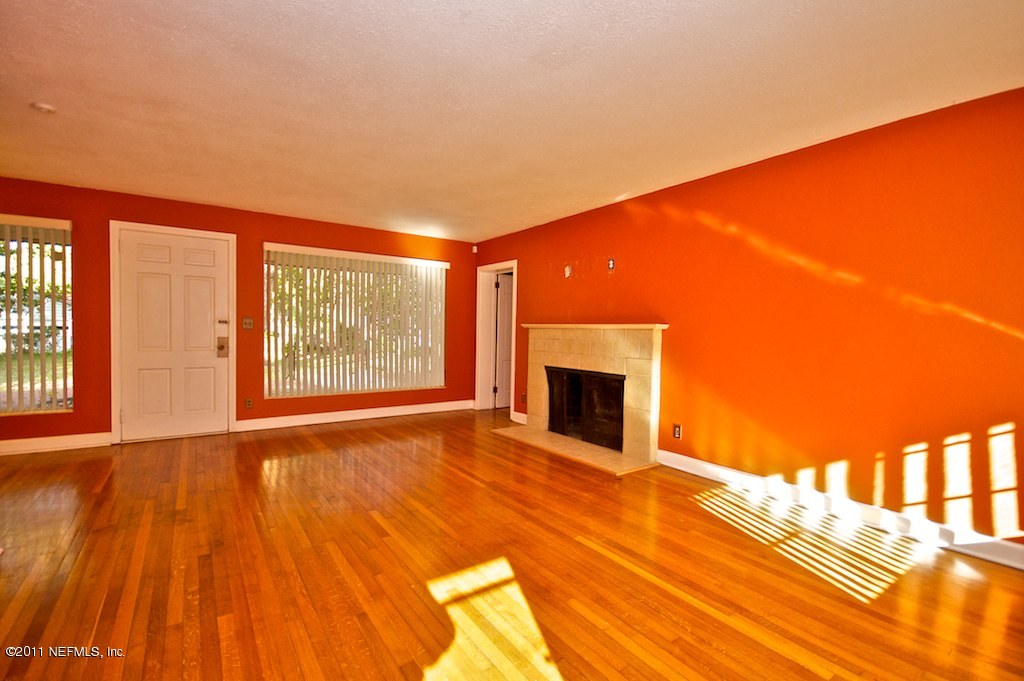 1407 Glengarry Road Jacksonville, FL 32207 - Photo 2 of 19 Living Room Fireplace Wall