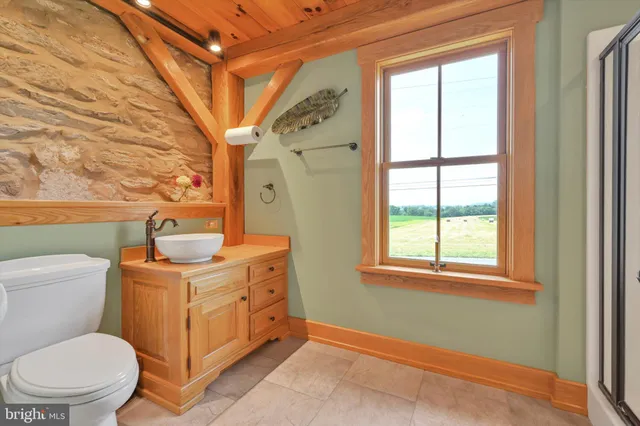 a view of swimming pool with an outdoor space and seating area