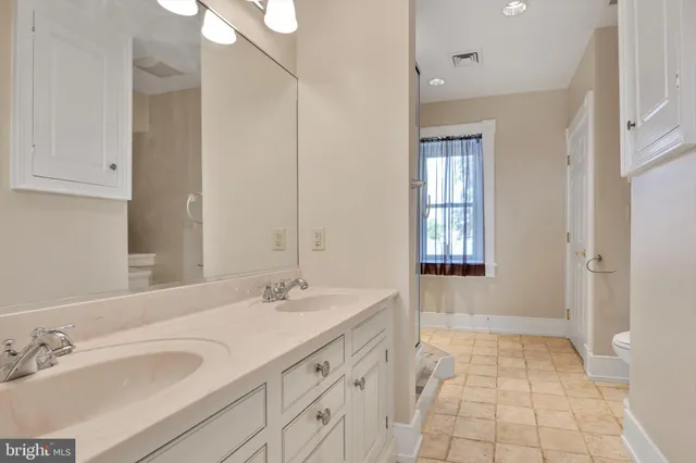 an aerial view of a house with outdoor space