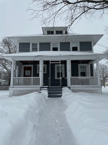 a view of a brick house with a window