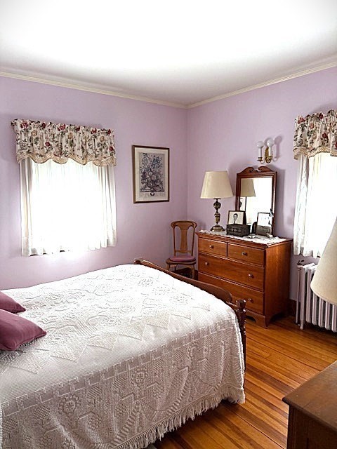 23 Nashua Street Ayer, MA 01432 - Photo 19 of 35 a bedroom with a bed and wooden floor
