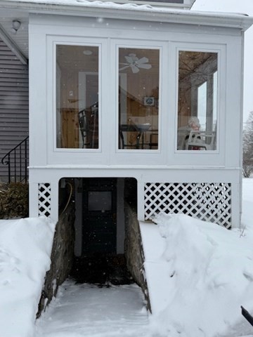 23 Nashua Street Ayer, MA 01432 - Photo 28 of 35 a black and white bench sitting in front of a building