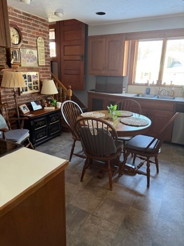 23 Nashua Street Ayer, MA 01432 - Photo 3 of 35 a backyard of a house with dining table and chairs