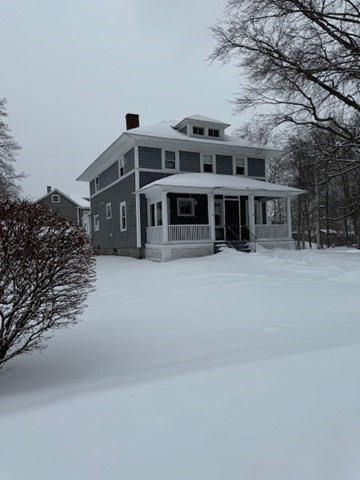 23 Nashua Street Ayer, MA 01432 - Photo 33 of 35 a front view of a building with a yard
