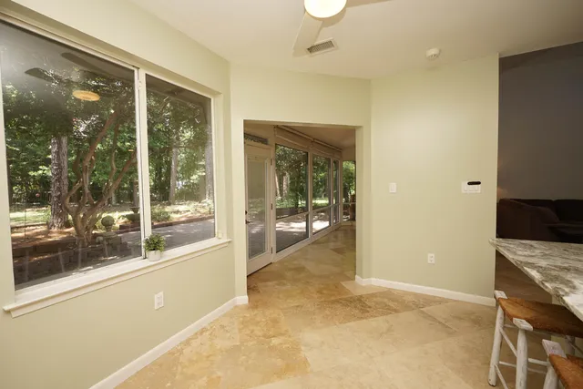 an empty room with windows