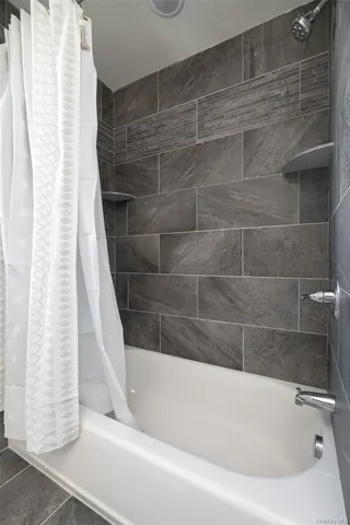 a bathroom with a bathtub