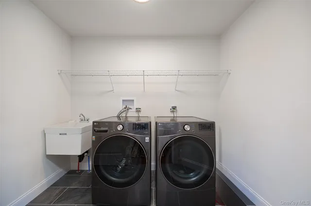 a utility room with dryer and washer