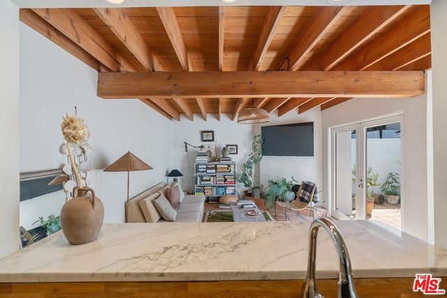 a view of a living room and dining room