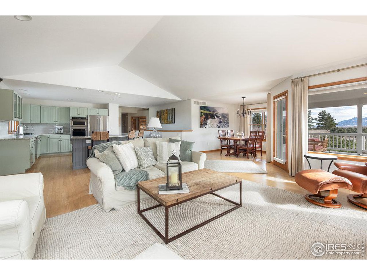8923 Sage Valley Road Longmont, CO 80503 - Photo 20 of 40 a living room with furniture and a table