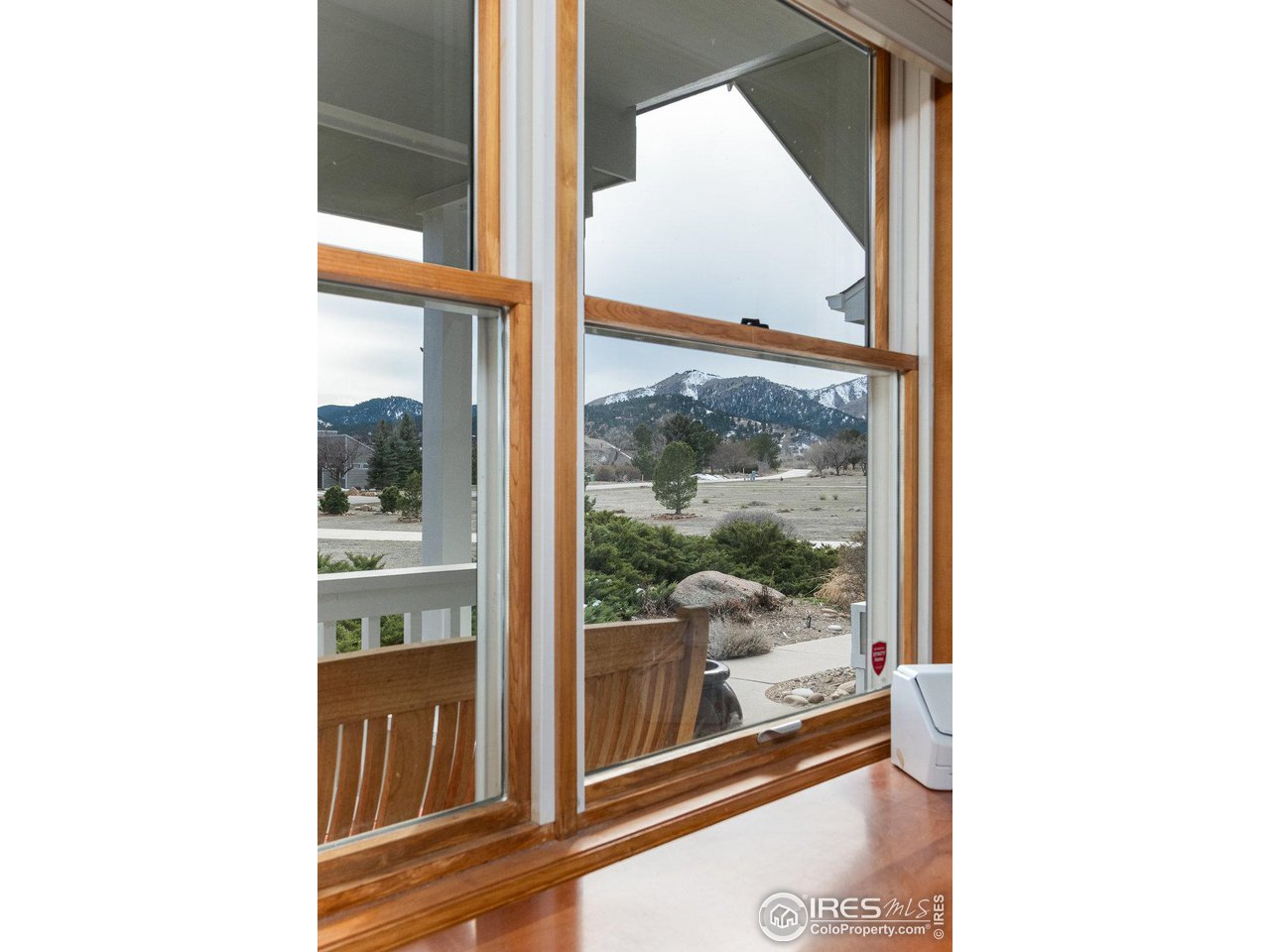 8923 Sage Valley Road Longmont, CO 80503 - Photo 23 of 40 a view of a living room with a large window