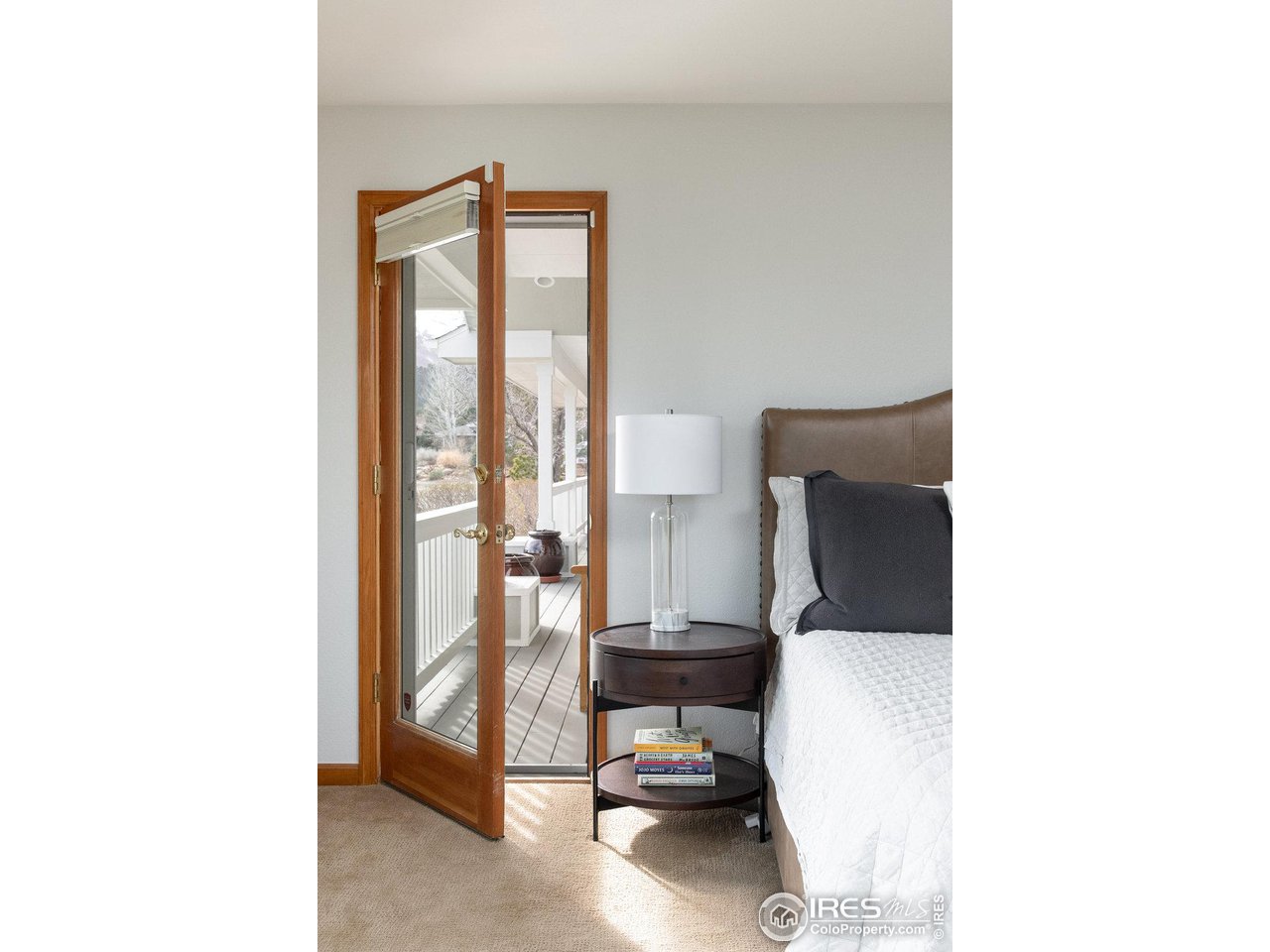 8923 Sage Valley Road Longmont, CO 80503 - Photo 26 of 40 a view of workspace with a window and couch