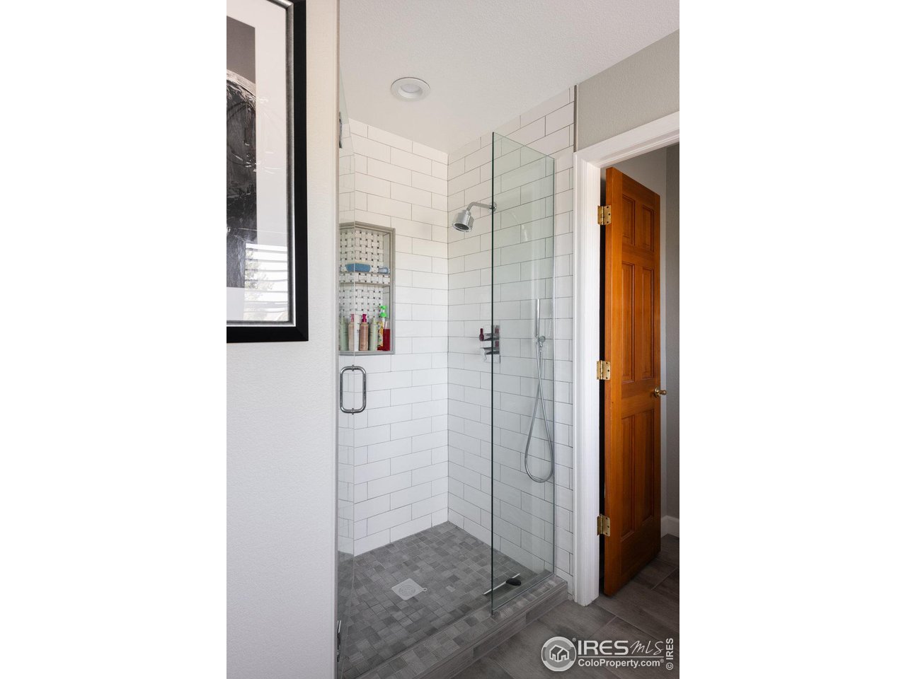 8923 Sage Valley Road Longmont, CO 80503 - Photo 30 of 40 a bathroom with a shower and a sink