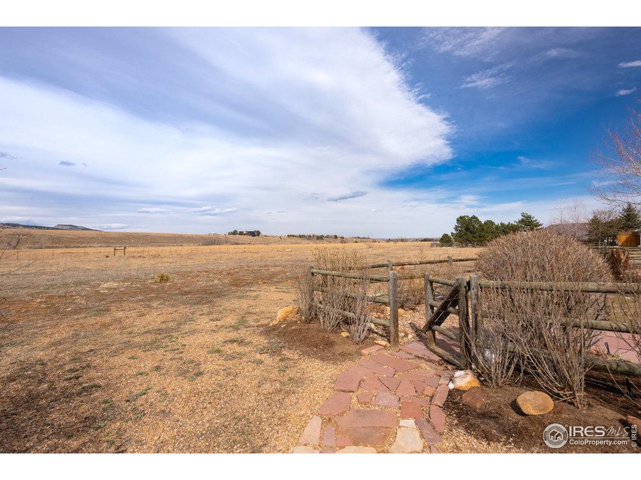 8923 Sage Valley Road Longmont, CO 80503 - Photo 36 of 40 a view of a city and ocean