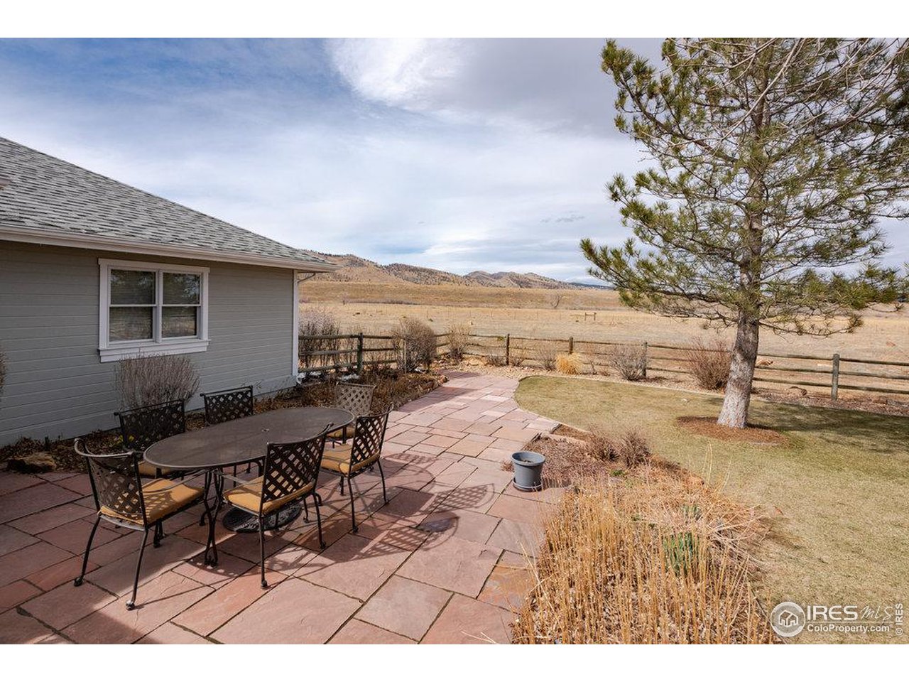 8923 Sage Valley Road Longmont, CO 80503 - Photo 39 of 40 a view of a terrace with chairs