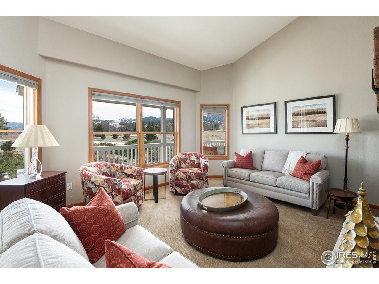 8923 Sage Valley Road Longmont, CO 80503 - Photo 8 of 40 a living room with furniture and a large window