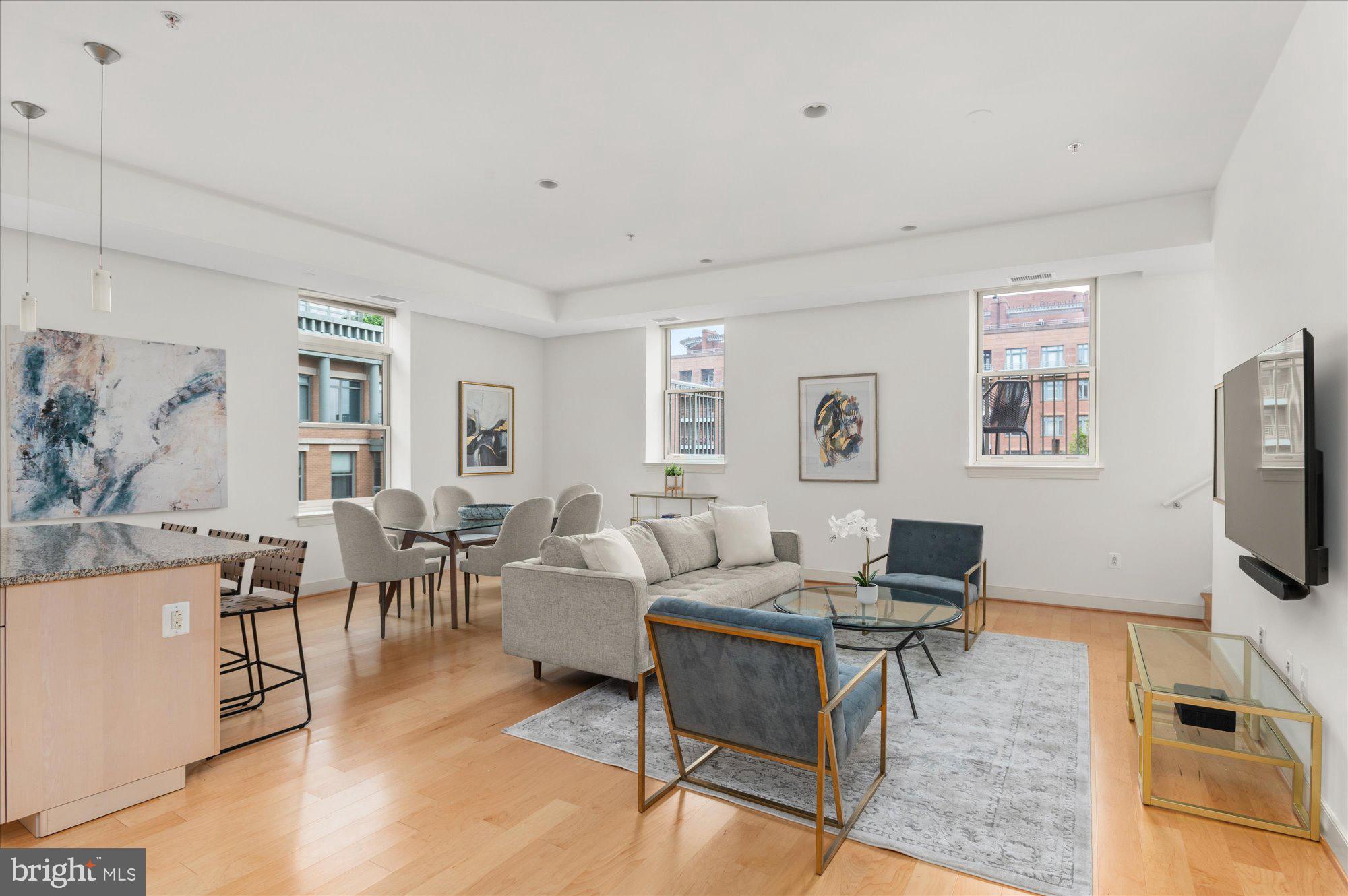 2425 L Street Northwest, Unit 524 Washington, DC 20037 - Photo 2 of 27 Light & bright living/dining area