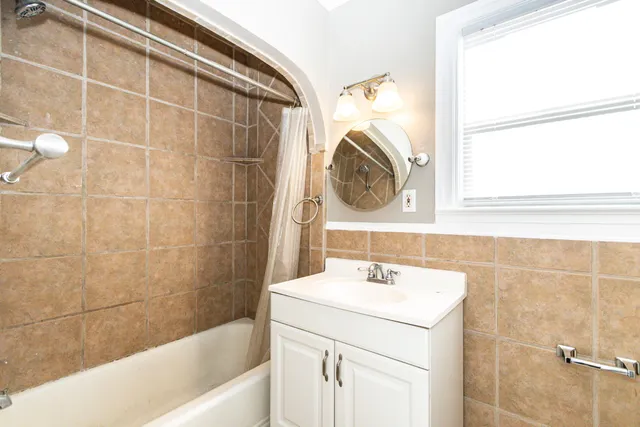 a bathroom with a sink and a bathtub