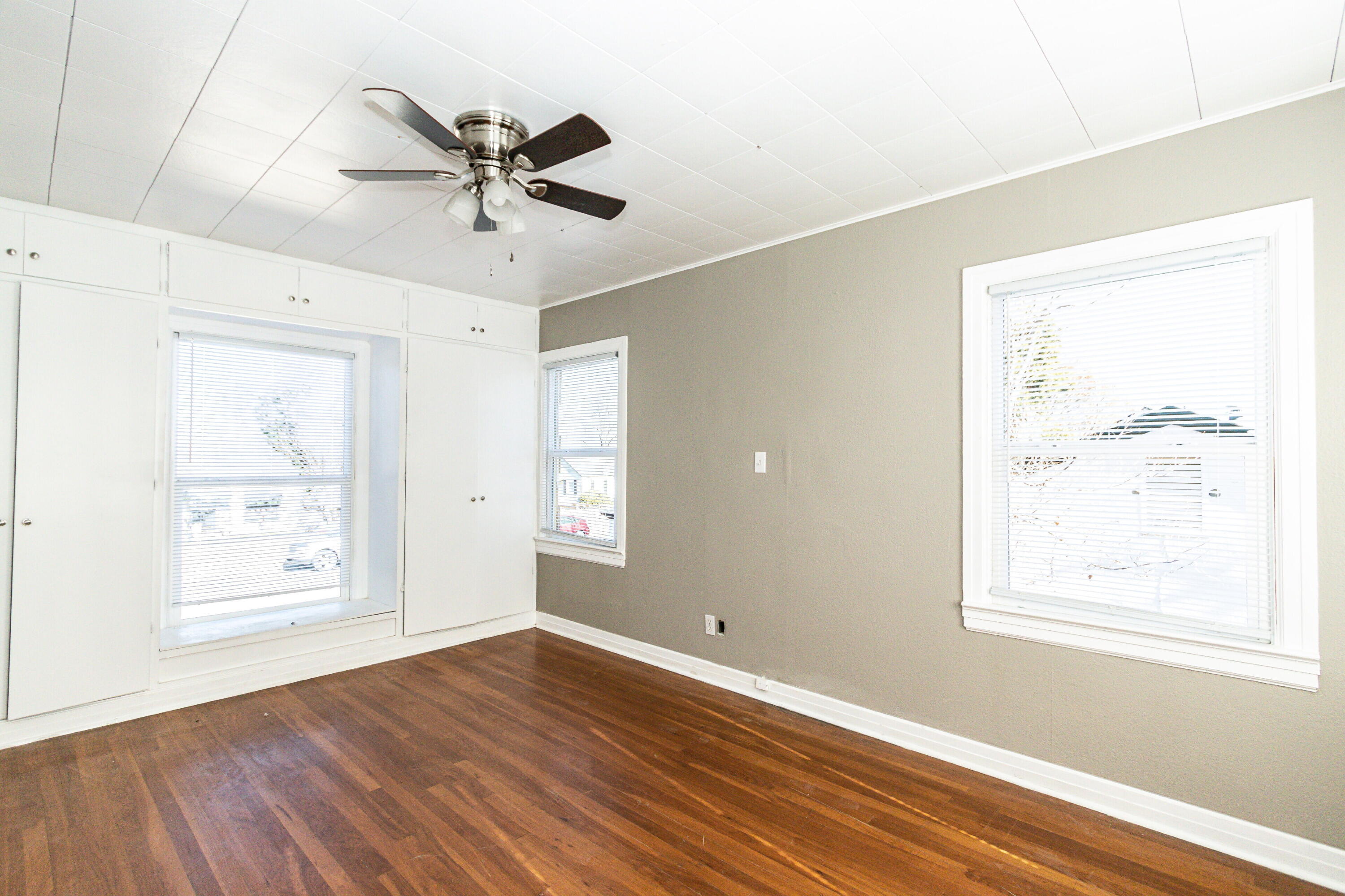 2417 25th Street Lubbock, TX 79411 - Photo 20 of 25 a view of a livingroom with a ceiling fan and window