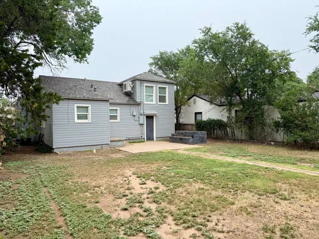 a house view with a outdoor space