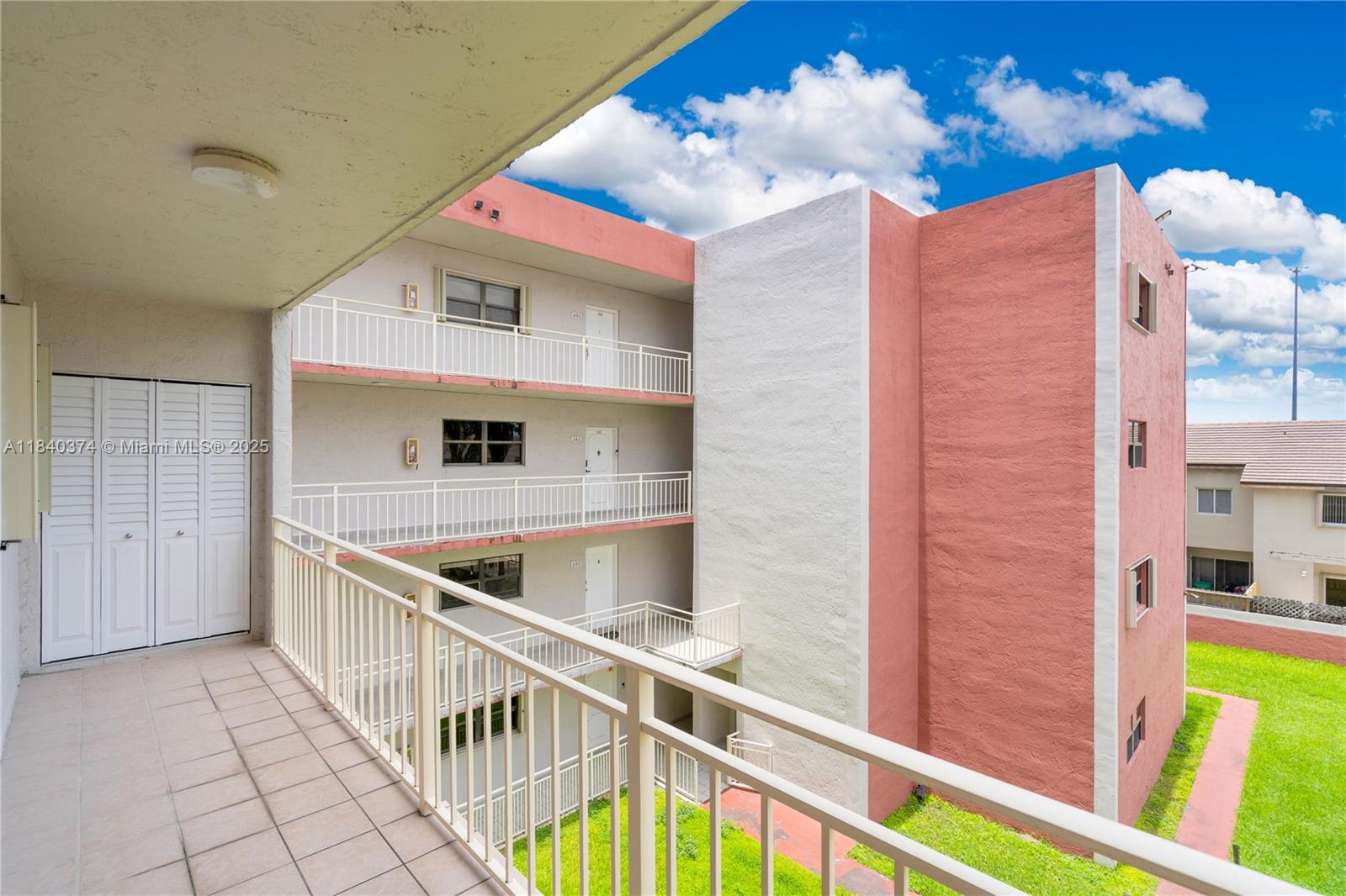 8425 Northwest 8th Street, Unit 304 Miami, FL 33126 - Photo 11 of 29 a view of an entryway with a kitchen
