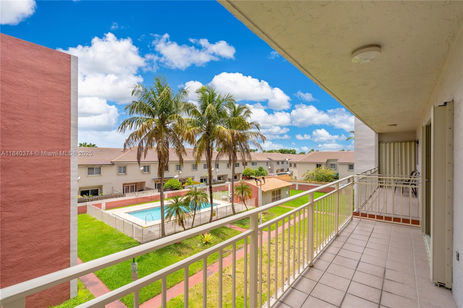 8425 Northwest 8th Street, Unit 304 Miami, FL 33126 - Photo 12 of 29 a view of balcony with a potted plant