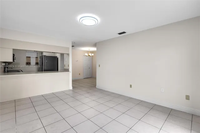 a view of a kitchen with a sink