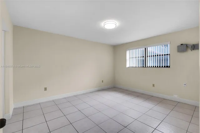 a view of an empty room with window