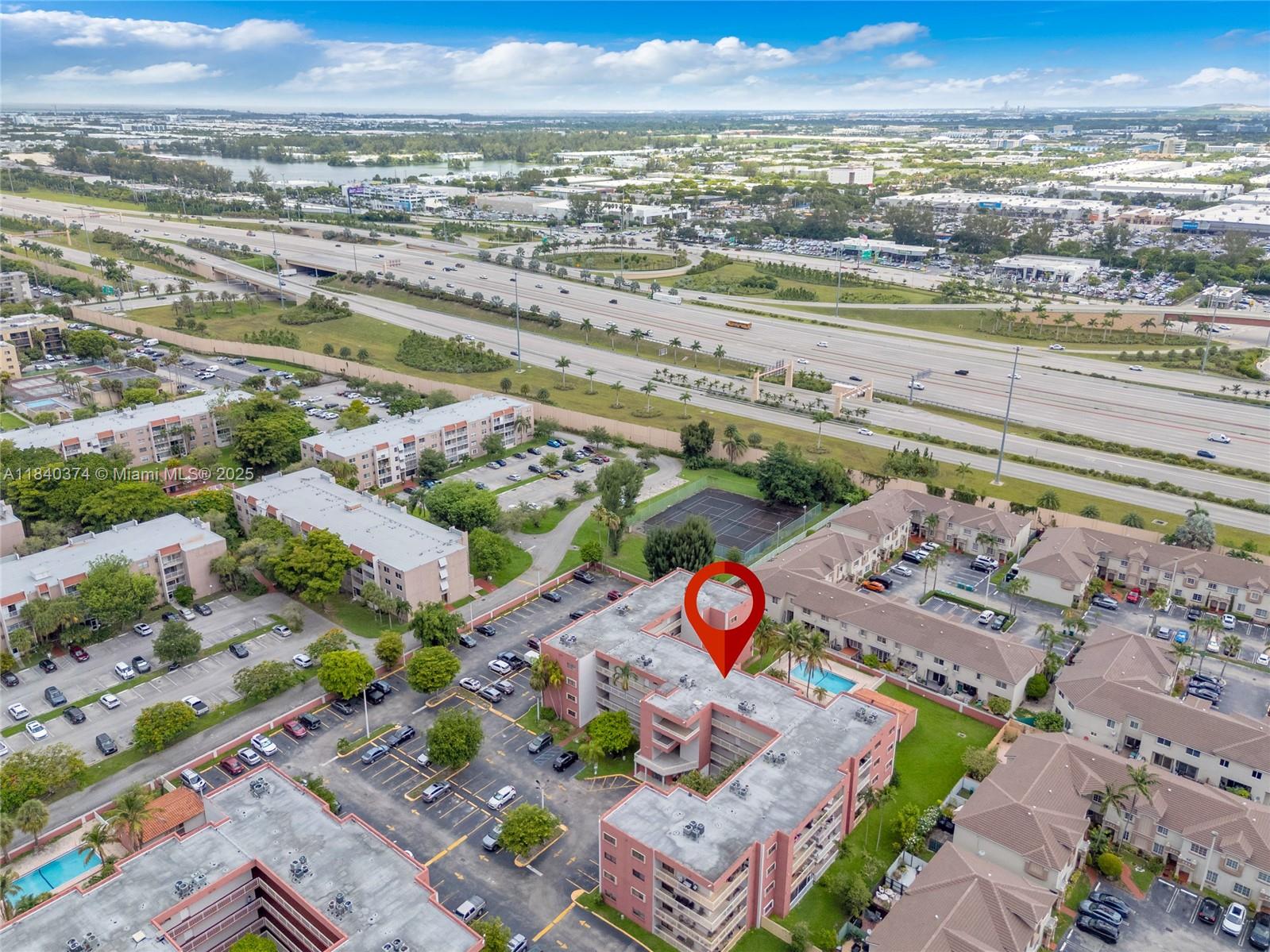 8425 Northwest 8th Street, Unit 304 Miami, FL 33126 - Photo 26 of 29 an aerial view of a city