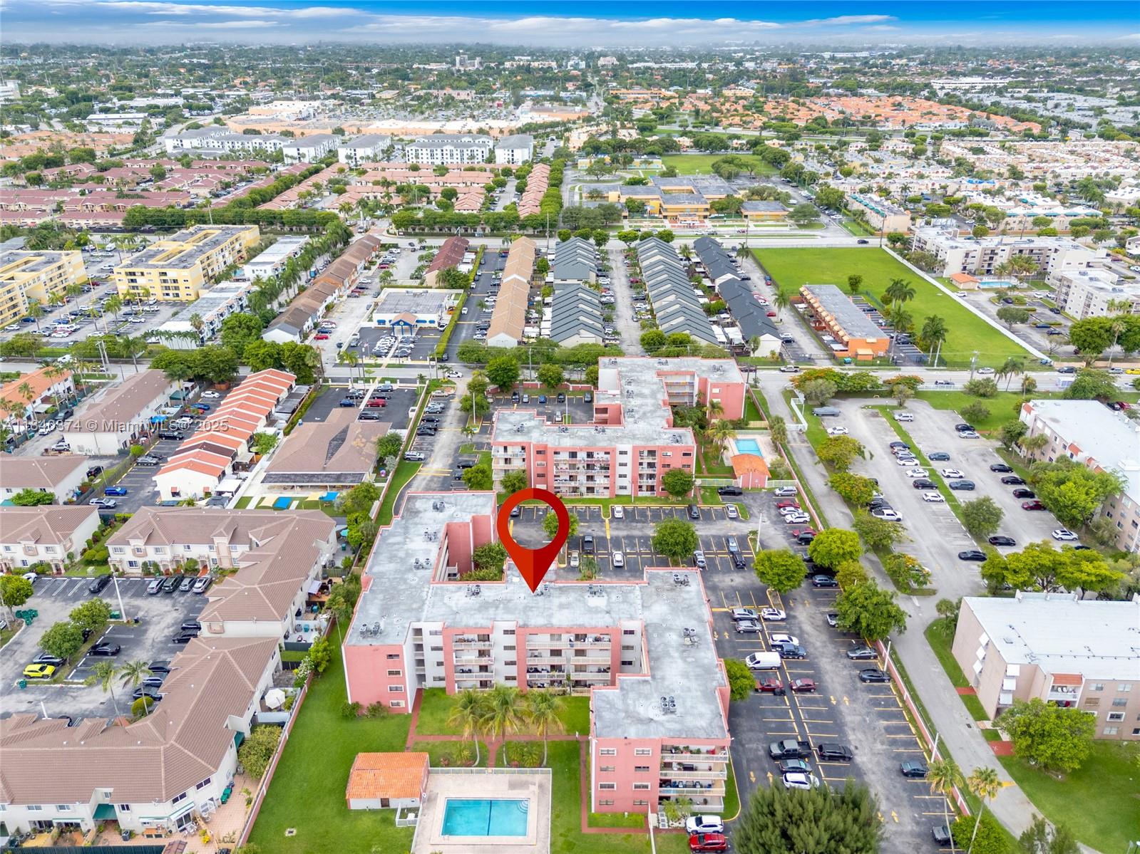 8425 Northwest 8th Street, Unit 304 Miami, FL 33126 - Photo 28 of 29 an aerial view of residential houses with outdoor space