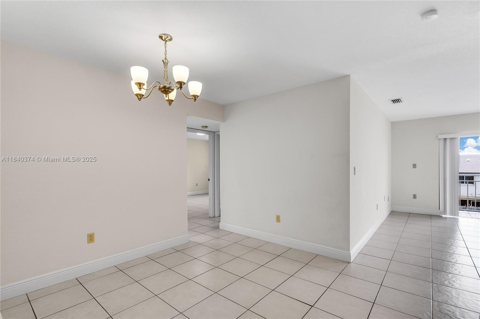 8425 Northwest 8th Street, Unit 304 Miami, FL 33126 - Photo 4 of 29 wooden floor in an empty room