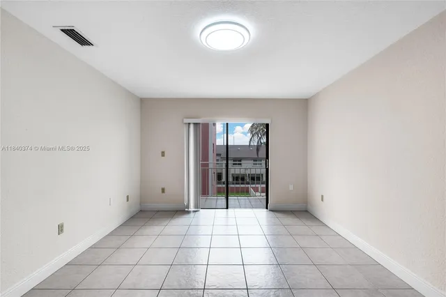 a view of an empty room with window