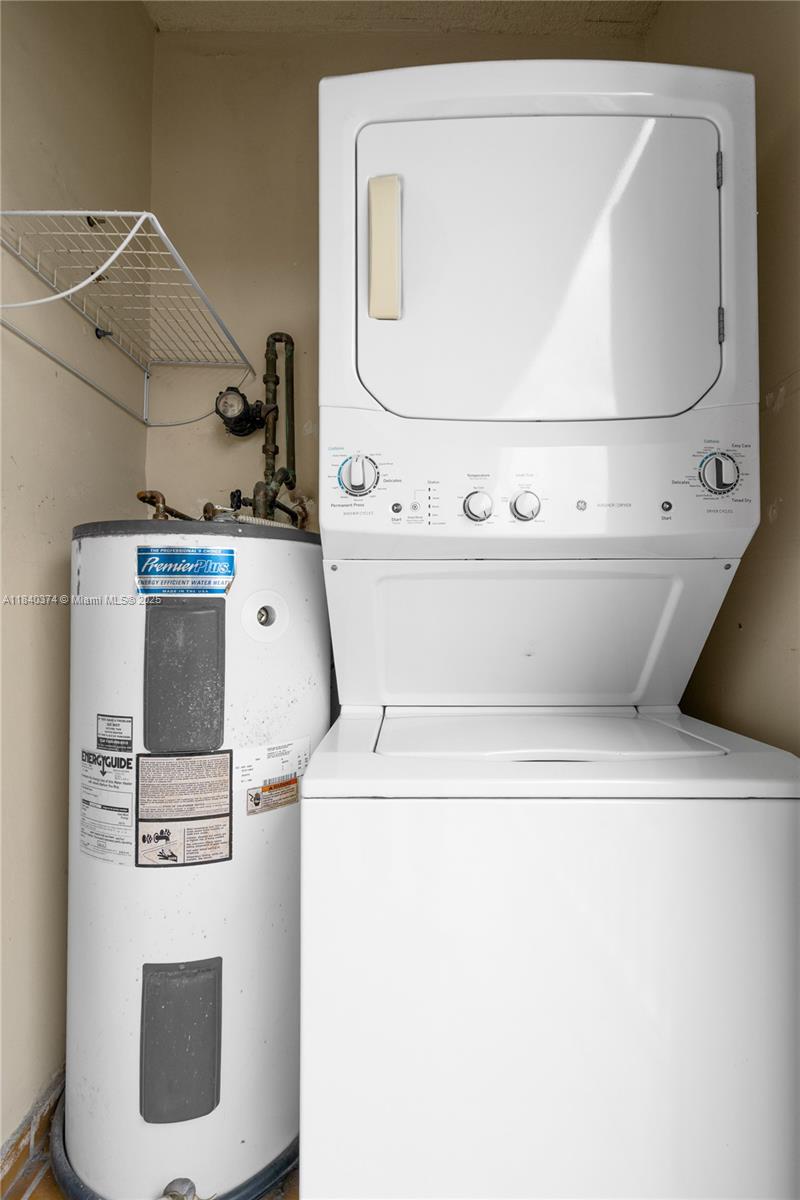 8425 Northwest 8th Street, Unit 304 Miami, FL 33126 - Photo 10 of 29 a view of washer and dryer