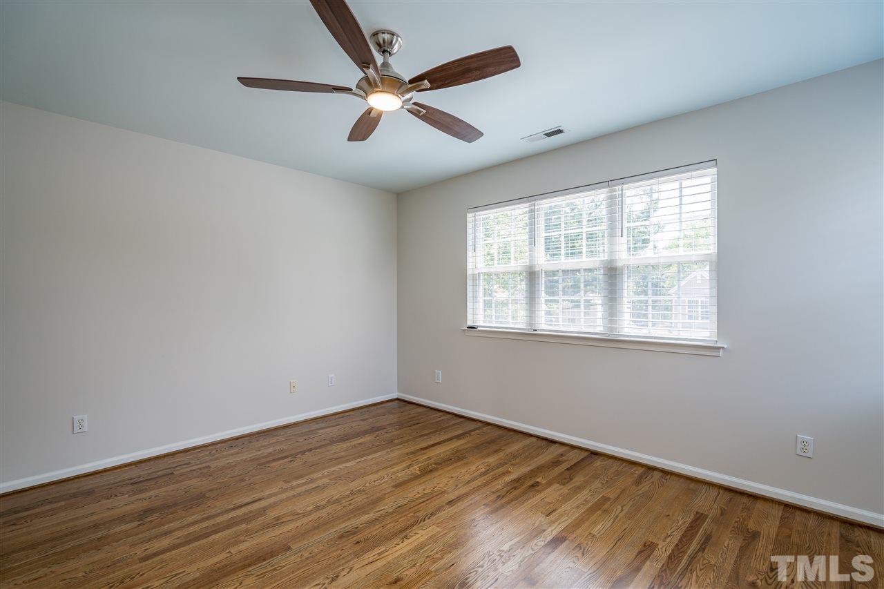 601 East Hargett Street Raleigh, NC 27601 - Photo 16 of 25 a view of a big room with wooden floor and windows