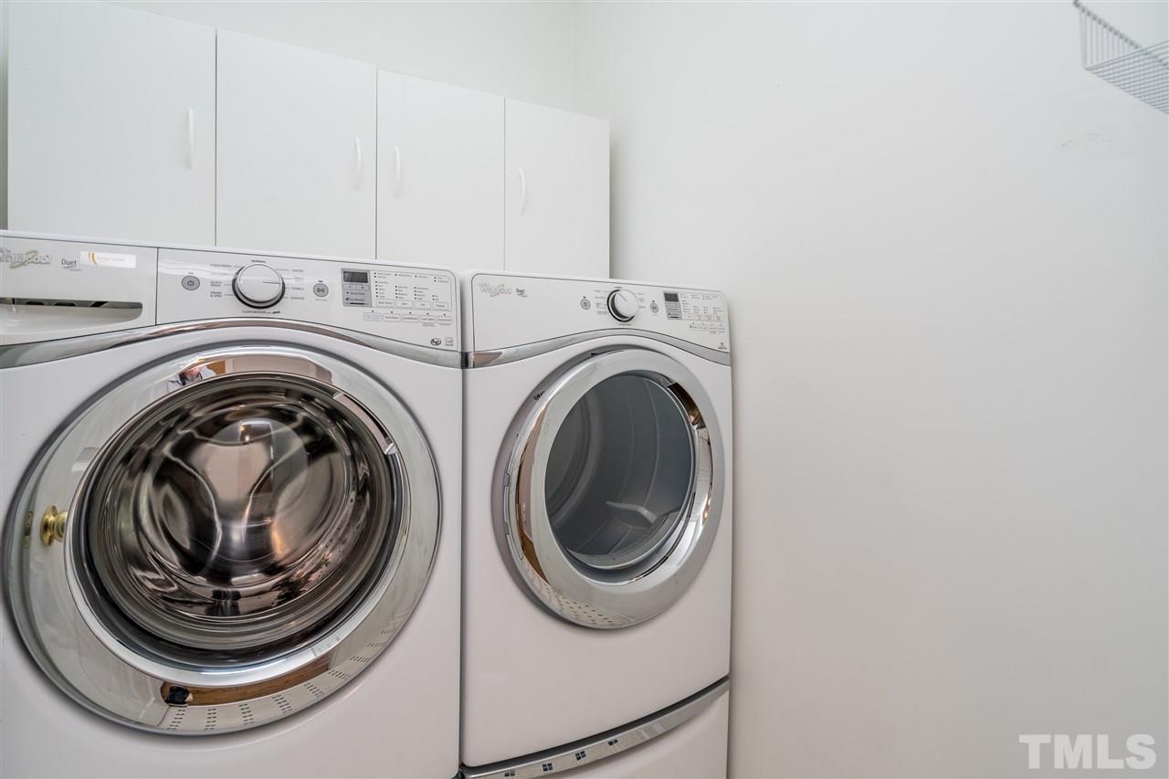 601 East Hargett Street Raleigh, NC 27601 - Photo 21 of 25 a utility room with dryer and washer