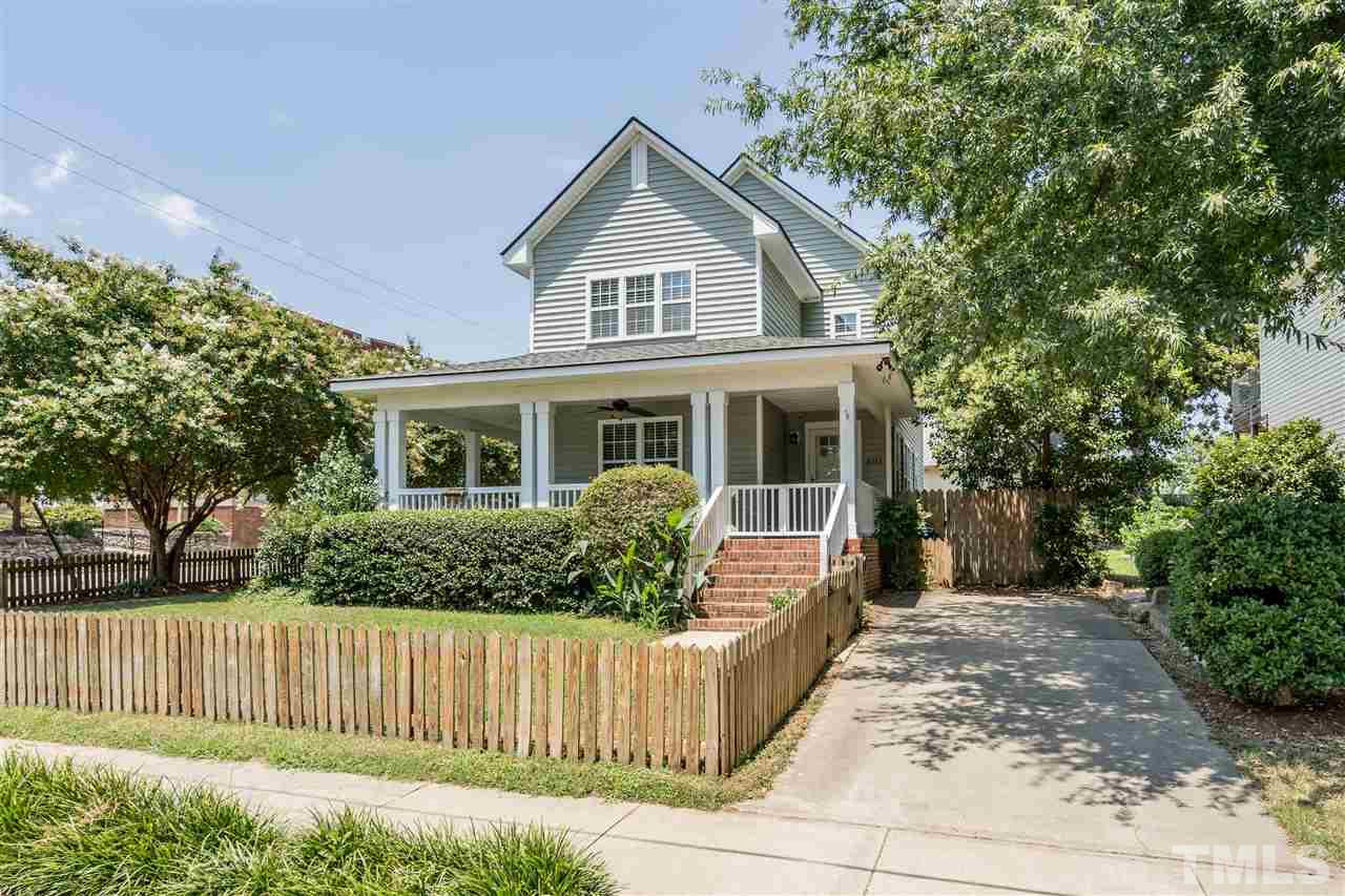 601 East Hargett Street Raleigh, NC 27601 - Photo 24 of 25 a front view of a house with a garden