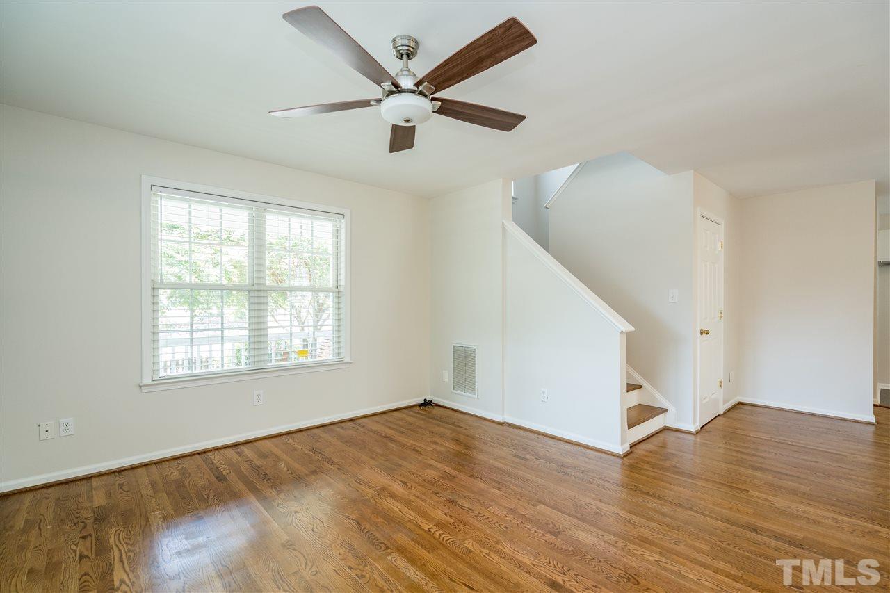601 East Hargett Street Raleigh, NC 27601 - Photo 6 of 25 wooden floor in an empty room with a window
