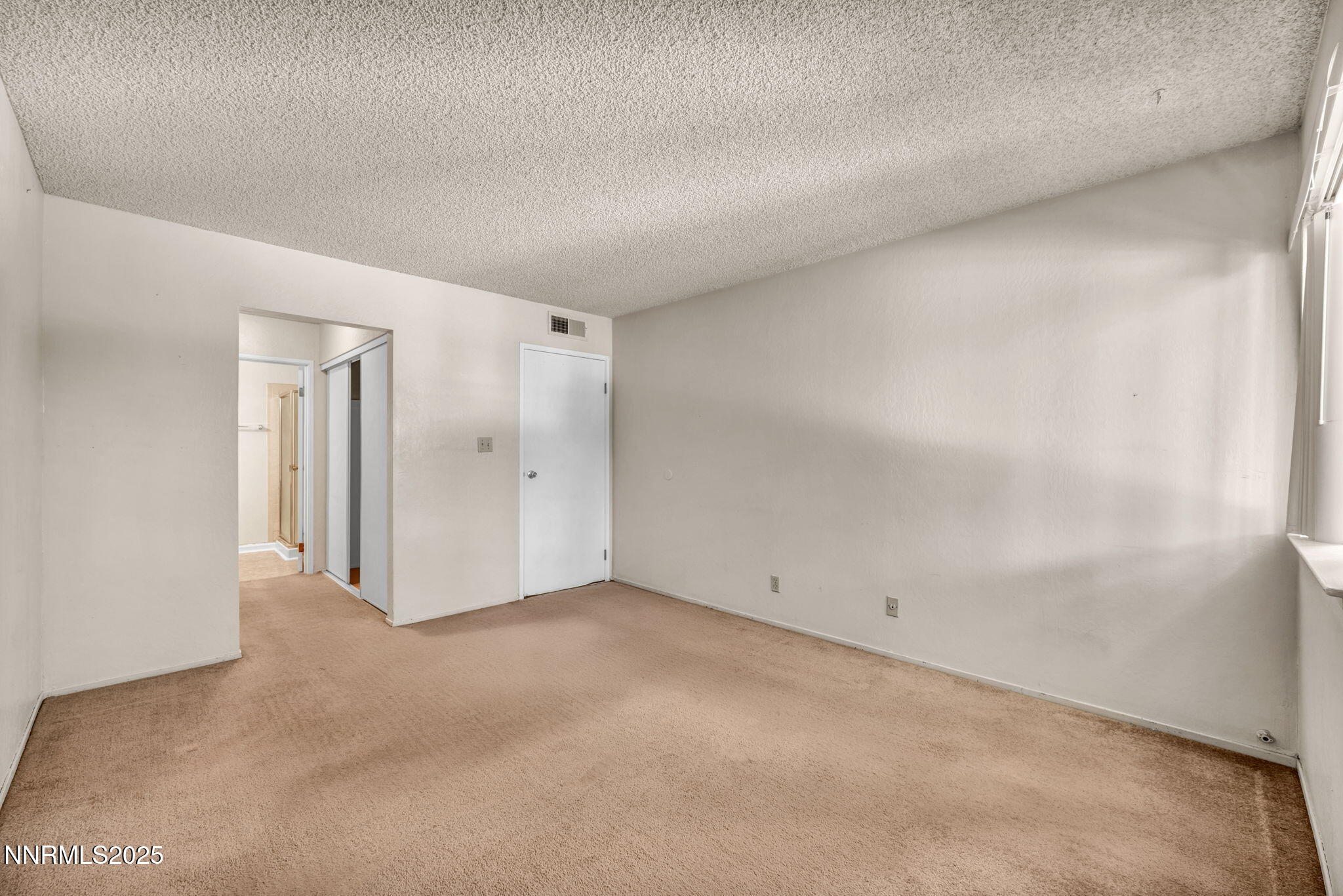 2955 Lakeside Drive, Unit 203 Reno, NV 89509 - Photo 21 of 35 Primary Bedroom