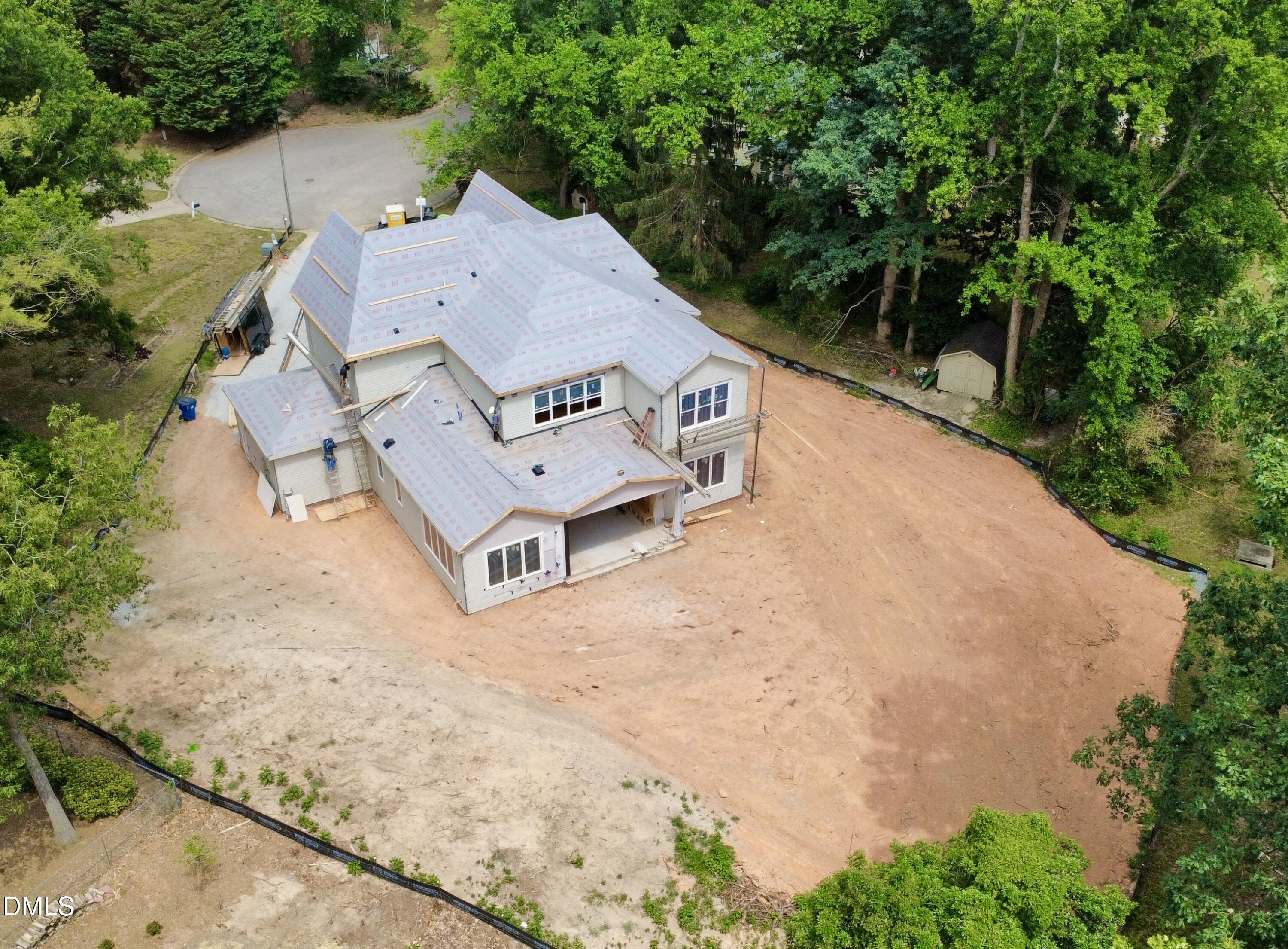 1504 Strothmore Court Raleigh, NC 27615 - Photo 4 of 32 an aerial view of a house with backyard