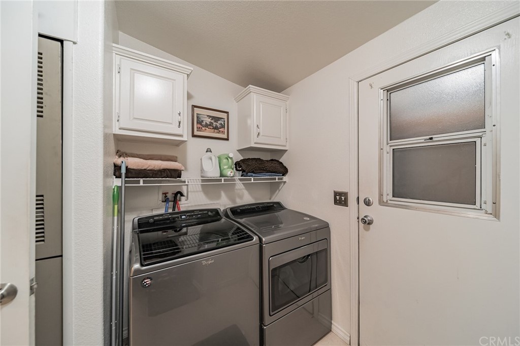 23301 Ridge Rte Drive, Unit 229 Laguna Hills, CA 92653 - Photo 22 of 26 a room with storage and utility