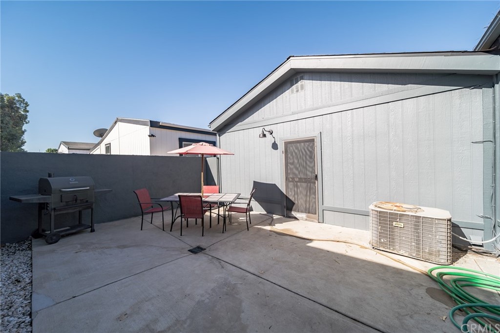 23301 Ridge Rte Drive, Unit 229 Laguna Hills, CA 92653 - Photo 25 of 26 a view of an outdoor sitting area with couch